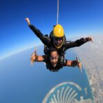 بلیط اسکای دایو دبی - Two men suspended in the sky of Dubai in Skydive Dubai